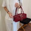 2be89152-39b7-4111-a698-147a0db79819-Max-Origin.jpg Rivet Embellished Crossbody Bag