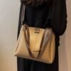 317f2037-765a-40f3-ac97-616adf9cac99-Max-Origin.jpg Wide Strap Shoulder Bag