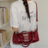 7c522243-fc0b-4116-960f-49a754bd213c-Max-Origin.jpg Rivet Embellished Crossbody Bag